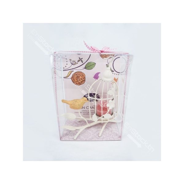 bougie avec design forme cage
